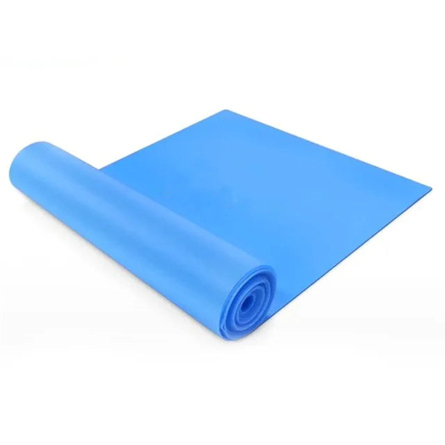Blue yoga mat rolled up on a white background