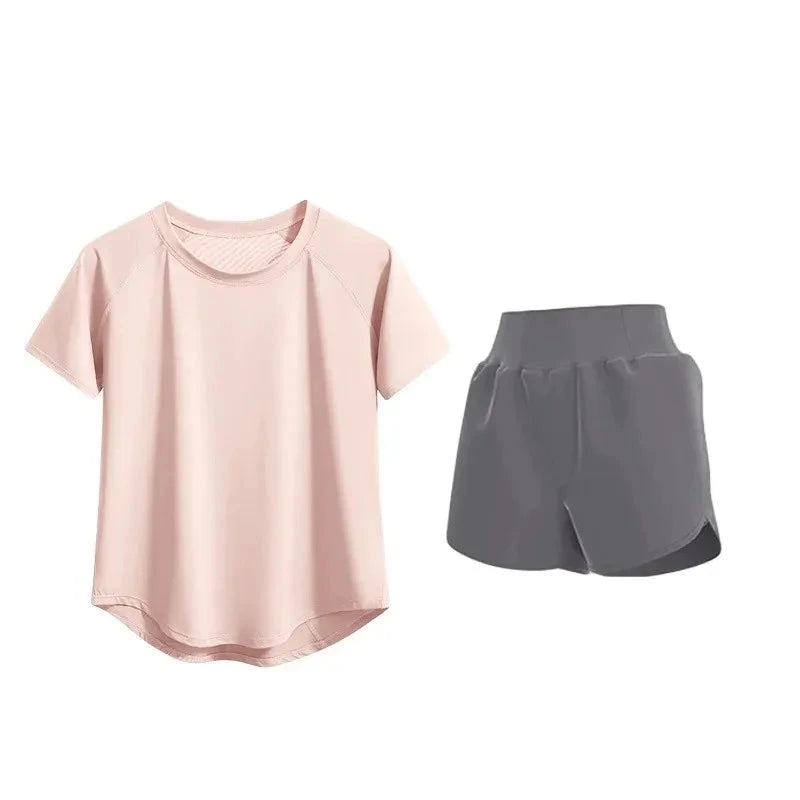Pink t-shirt and gray shorts labeled 'Fitness uniform set' on a white background
