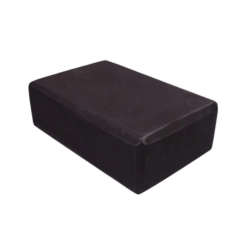 Black rectangular ottoman on a white background