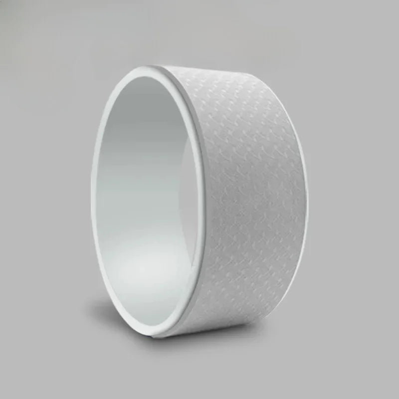 White cylindrical object with textured surface on a gray background