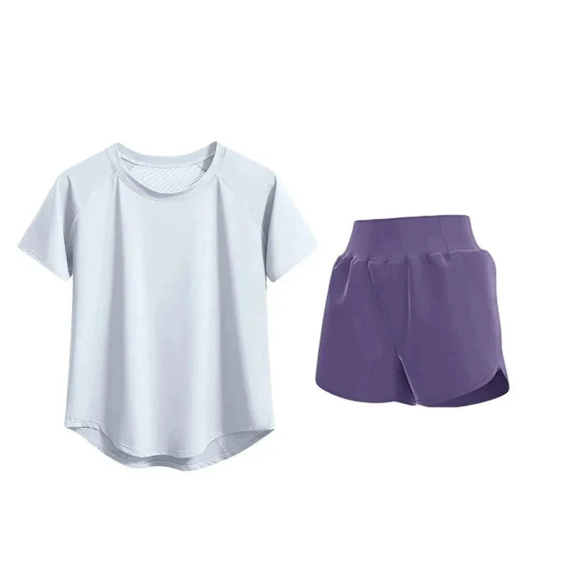 Fitness uniform set with white t-shirt and purple shorts on a white background