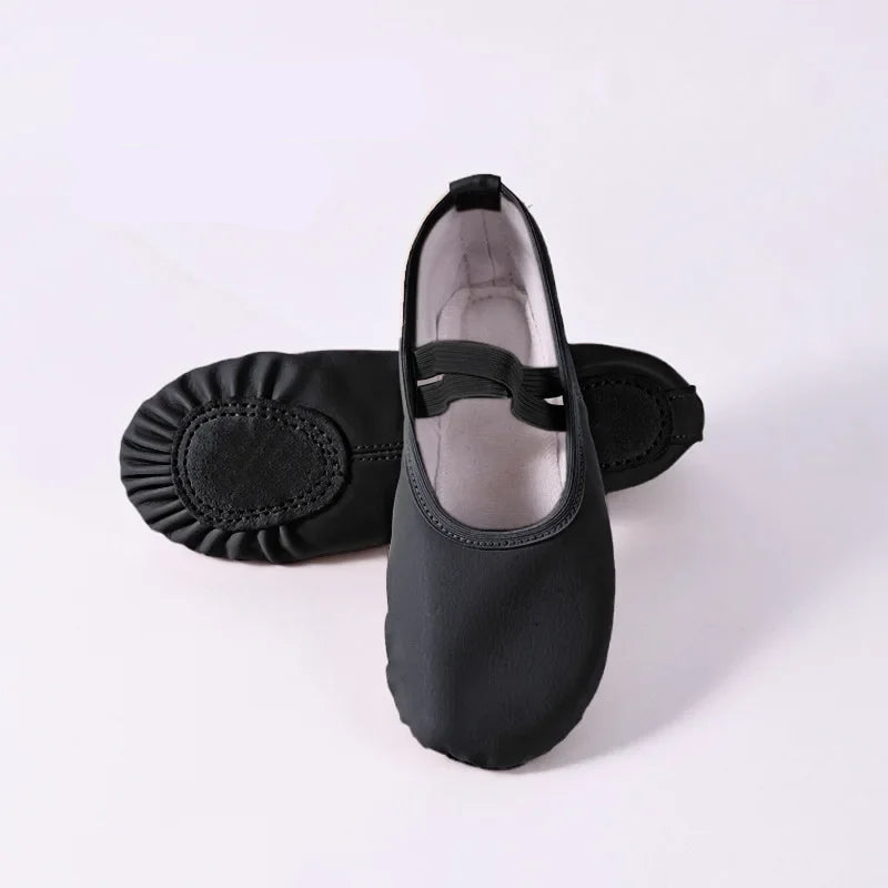 Black ballet shoes on a white background with text overlay