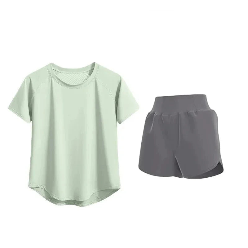 Fitness uniform set with a light green t-shirt and gray shorts on a white background.