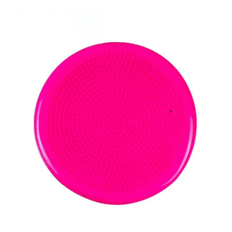 Pink round object with textured surface on a white background