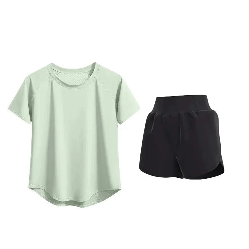 Light green t-shirt and black shorts on a white background with 'Fitness uniform set' text.