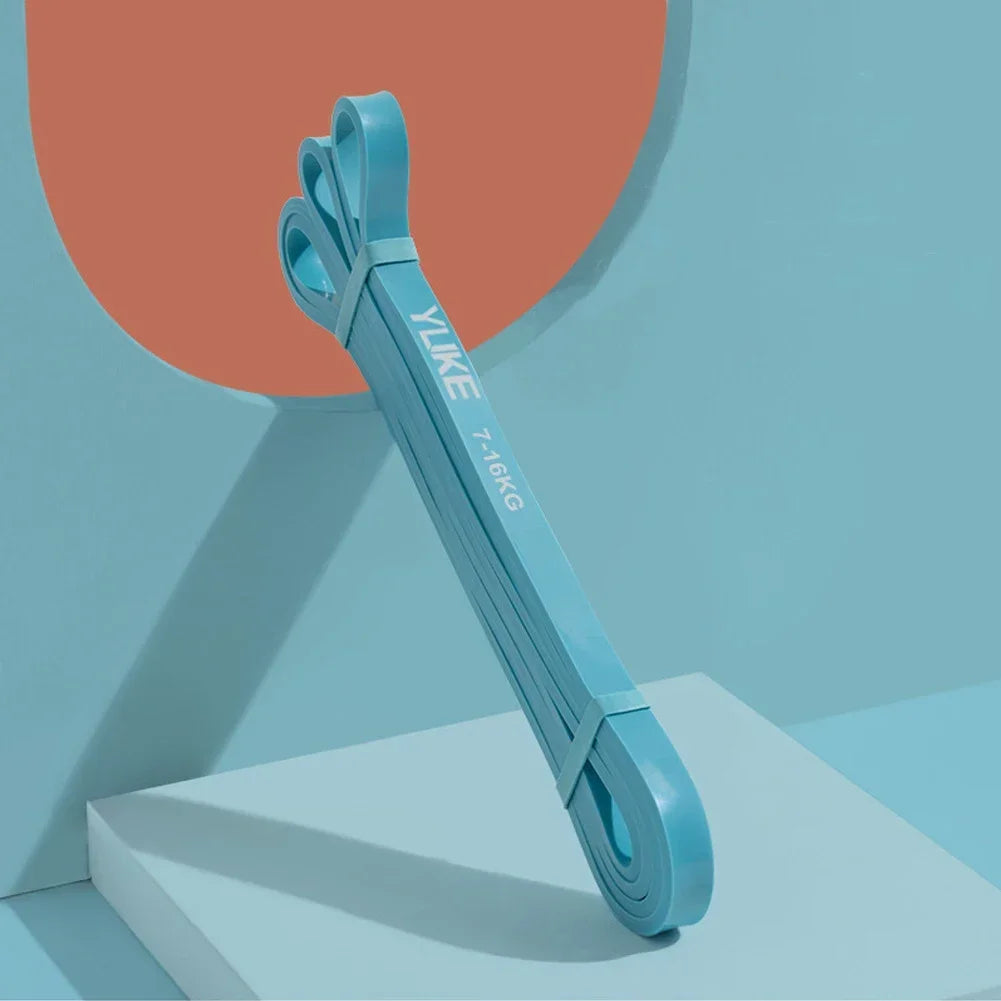 Blue baby clip with 'Yike' branding on a geometric background