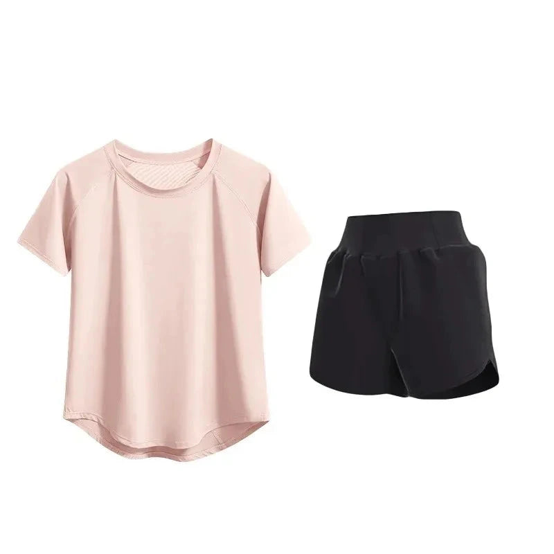 Pink t-shirt and black shorts labeled 'Fitness uniform set' on a white background