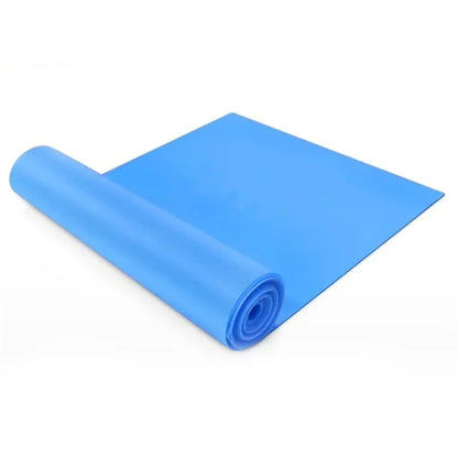Blue yoga mat rolled up on a white background