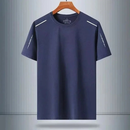 Navy blue t-shirt with white accents on a hanger against a gray background