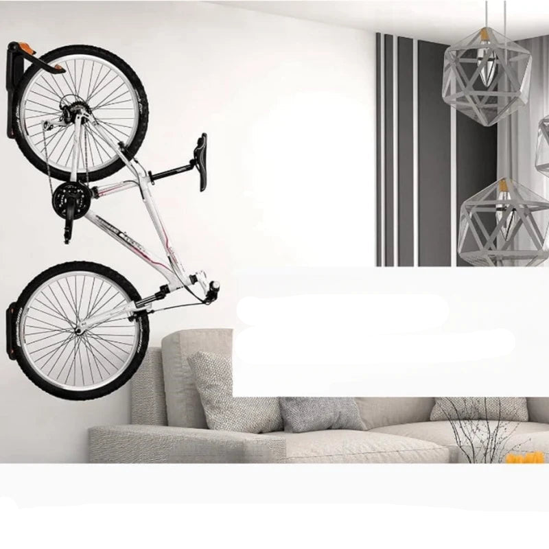 Bicycle mounted on a wall above a sofa with text about space-saving benefits.