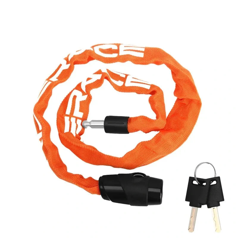 Orange bicycle chain lock with keys on a white background