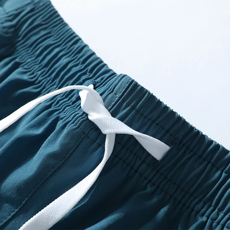 מכנסי ריצה קצרים מקצועיים - מכנסי ספורט דרייפיט ונושמים לגברים